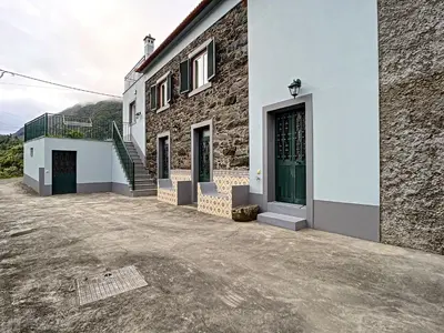 a building with a stairway and a building with a door at Villa Bella Vista by AH in São Vicente