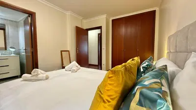 a bedroom with a bed with towels on it at Vista Pena in Funchal