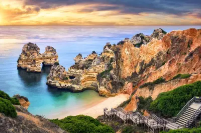 a view of a beach with rocks in the ocean at Briso do Mós in Lagos