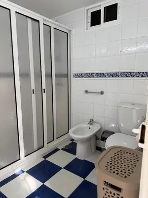 a bathroom with a toilet and a sink at Casa da Cruz in Ponta do Sol