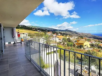 a balcony with a view of the ocean at New Villa Piece of Heaven by Your Madeira Rentals in Estreito da Calheta