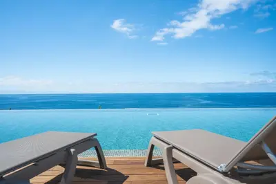 a view of the ocean from the deck of a villa at Ocean Refuge by Atlantic Holiday in Funchal