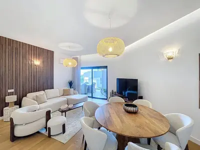 a living room with a couch and a table at Ocean Refuge by Atlantic Holiday in Funchal