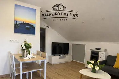 a kitchen with a sink and a stove at Palheiro dos 3 A`s in Achadas da Cruz