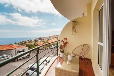 a balcony with a view of the ocean at GuestReady - Ocean breeze retreat in Santa Cruz