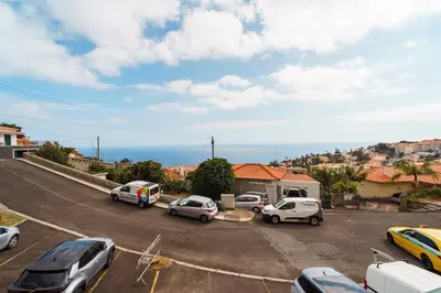 a group of cars parked in a parking lot at GuestReady - Ocean breeze retreat in Santa Cruz