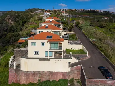 an aerial view of a house on a hill at Skyline Villa by Holiday Rental Madeira in Gaula