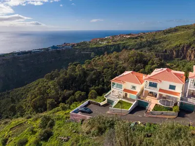 an aerial view of a house on a hill at Skyline Villa by Holiday Rental Madeira in Gaula