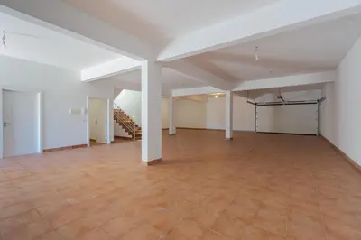an empty room with a tile floor and white ceilings at Skyline Villa by Holiday Rental Madeira in Gaula