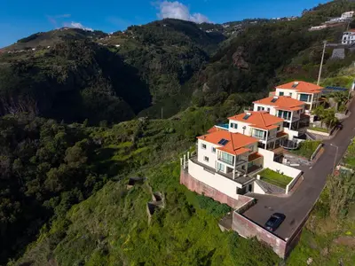 an aerial view of a house on a mountain at Skyline Villa by Holiday Rental Madeira in Gaula