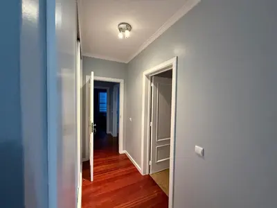an empty hallway with a white door and a room at Atlantic Breeze - Free Parking in Funchal