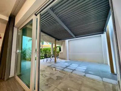 an open garage with awning on a house at Alameda Formosa Madeira in Funchal