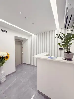 an office with a white counter and a plant at Gold Center Funchal 101 in Funchal