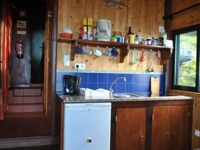 a kitchen with a sink and a counter top at Holiday Home in Canhas mit Schönem Garten by Interhome in Ponta do Sol