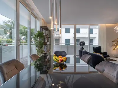 a living room with a bowl of fruit on a glass table at Apartment Movenpick Apartment by Interhome in Funchal