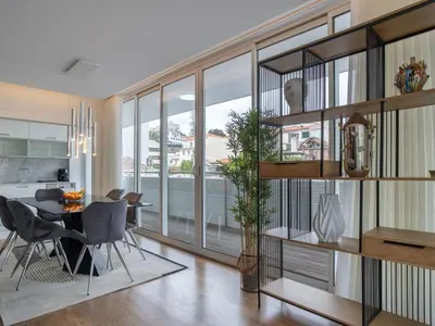 a kitchen and dining room with a table and chairs at Apartment Movenpick Apartment by Interhome in Funchal