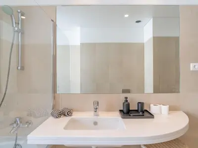 a bathroom with a sink and a mirror at Apartment Movenpick Apartment by Interhome in Funchal