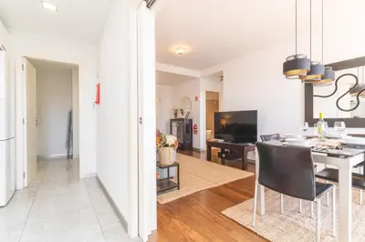 a dining room and living room with a table and chairs at Calas Loft by Atlantic Holiday in Funchal