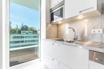 a kitchen with a sink and a window at Calas Loft by Atlantic Holiday in Funchal