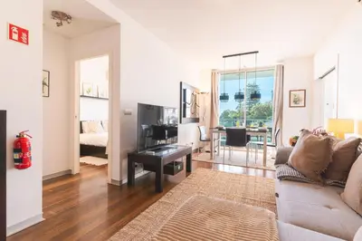 a living room with a couch and a table at Calas Loft by Atlantic Holiday in Funchal