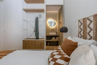 a bathroom with a sink and a shower at Moradia Exclusiva V3 com Piscina Privada e Vista Mar- Salema in Salema