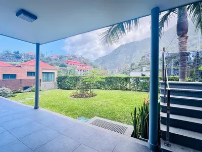 a balcony with a view of a yard at Bela Vista Studio in Ponta Delgada