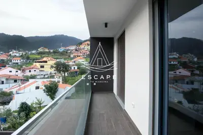 a balcony with a view of a city at Villa Golden by Escape to Madeira in Machico
