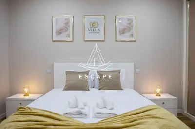 a bedroom with a bed with an escape sign on it at Villa Golden by Escape to Madeira in Machico