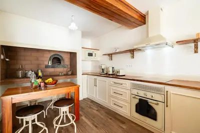 a villa with a swimming pool and a house at Casa da Avolita, by Rent2u, Lda in Arco da Calheta