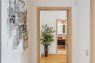 a hallway with a plant in a vase at Half Gate Villa in Gaula