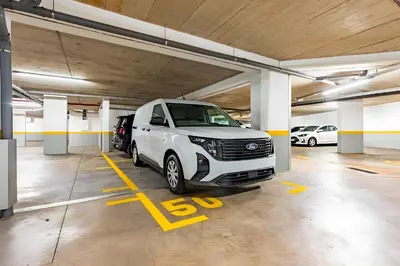 a white van parked in a parking garage at Casa Sol in Caniço