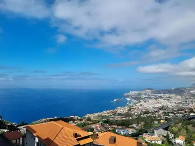 a view of the ocean and a city at City Views Apartment Funchal in Funchal