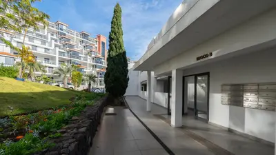 a rendering of the entrance to a building at Amethyst by LovelyStay in Caniço
