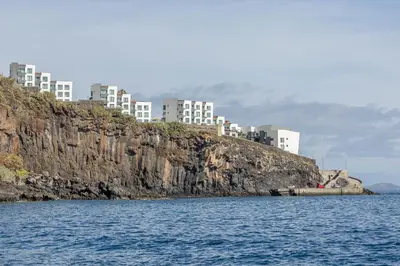 a group of buildings on top of a cliff at Luna do Mar - Luxury apt with Jacuzzi in Gaula