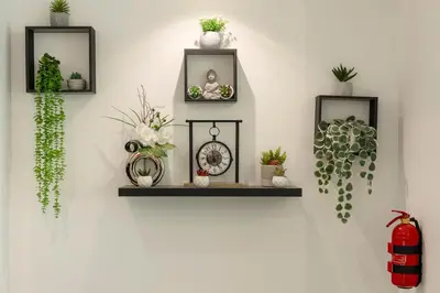 a white wall with three black shelves with plants at Luna do Mar - Luxury apt with Jacuzzi in Gaula