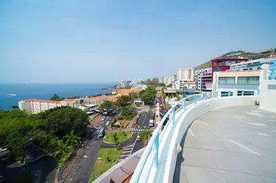 a view of a city with a bridge over a street at Madeira Sun in Funchal