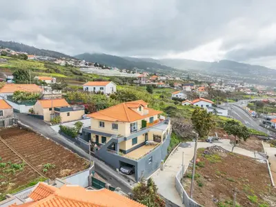 an aerial view of a city with houses at Casa Avô ladeira 2 in Estreito da Calheta