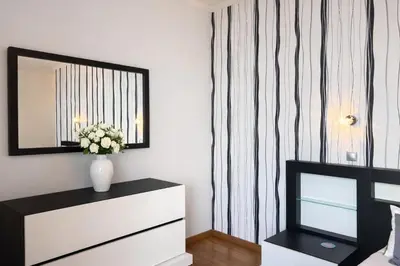 a living room with a dresser and a mirror at Villa Vieira Ocean View in Gaula