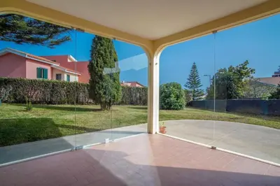 a bathroom with a shower and a toilet and a sink at Villa Teresinha in Relógio do Poiso