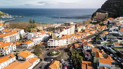 an aerial view of a city with orange roofs at Machim by SALIM in Machico