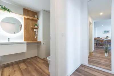 a bathroom with a toilet and a sink at Big Cliff - Ocean View by AH in Câmara de Lobos