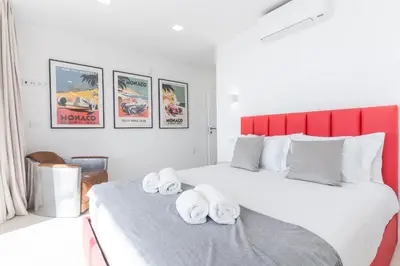 a bedroom with two beds with towels on them at Villa Devaneio - Amazing Ocean View by Atlantic Holiday in Ribeira Brava