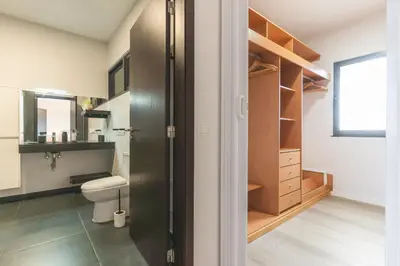 a bathroom with a toilet and a sink at Villa Sofia by Atlantic Holiday in Machico