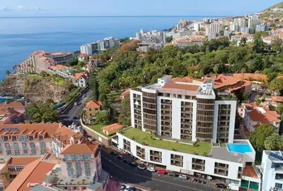 an aerial view of a city with the ocean at Sea View 1 Bedroom Apartment Funchal in Funchal