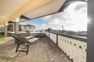 a view from the balcony of a house at Abrigo dos Prazeres Guesthouse by Mth in Prazeres