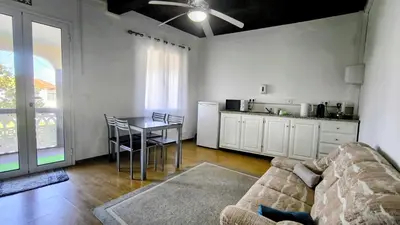 a living room with a couch and a table at Abrigo dos Prazeres Guesthouse by Mth in Prazeres