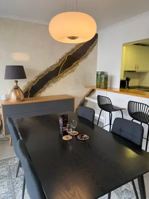 a hallway in a house with a damaged wall at Infante Home I in Funchal