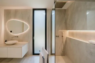a bathroom with a sink and a mirror at Villa Guindaste II Luxury with Pool & Sea View in Santana