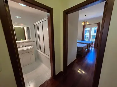 a bathroom with a sink and a mirror at Formosa View in Funchal