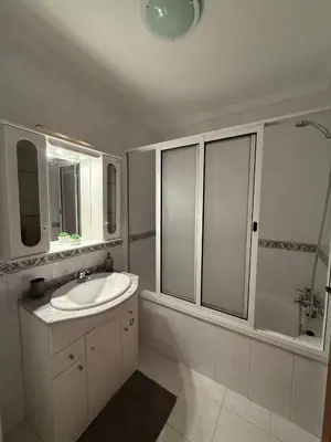 a bedroom with a large bed and a large mirror at Formosa View in Funchal